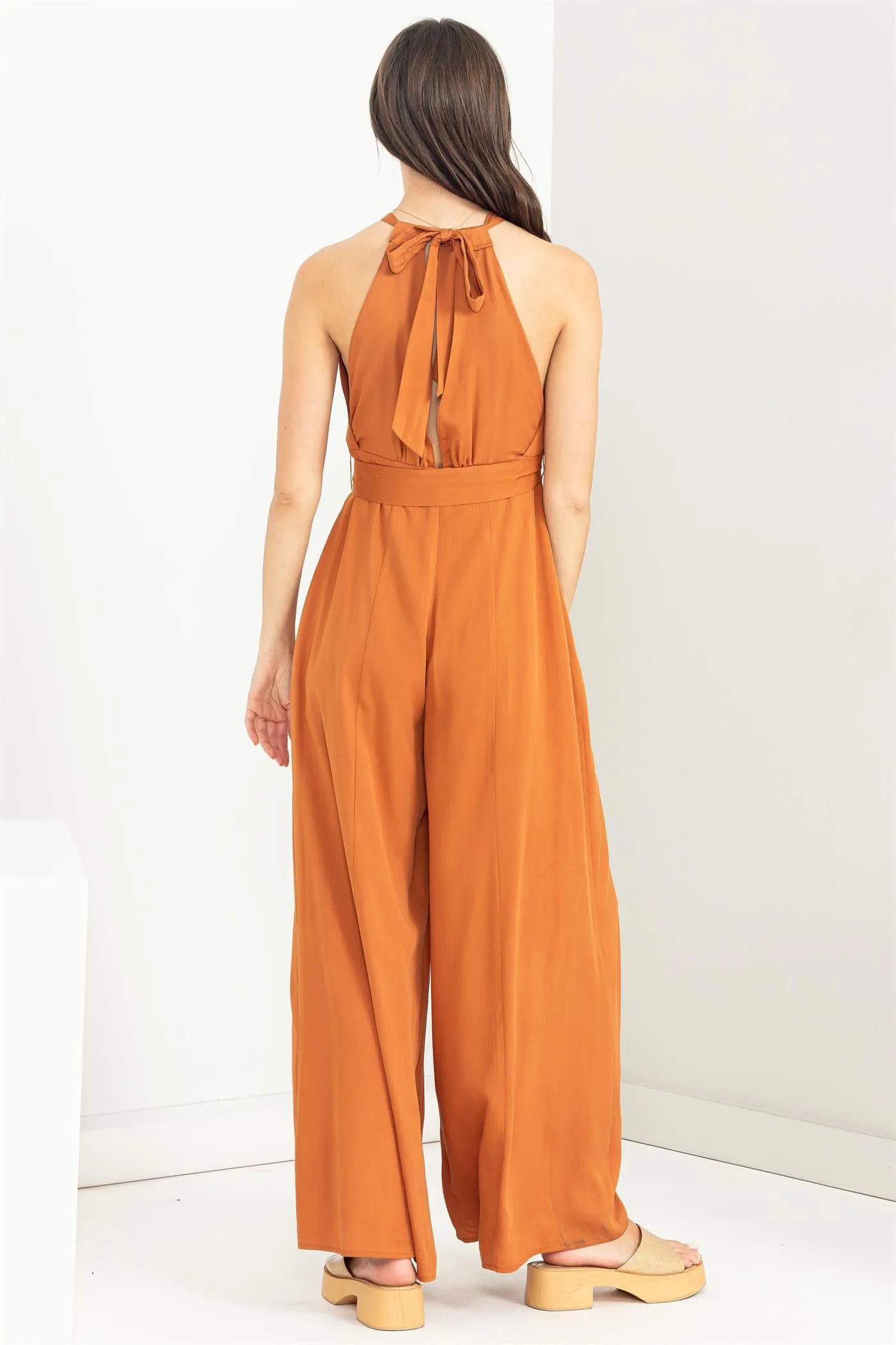 BELTED SLEEVELESS HALTER JUMPSUIT