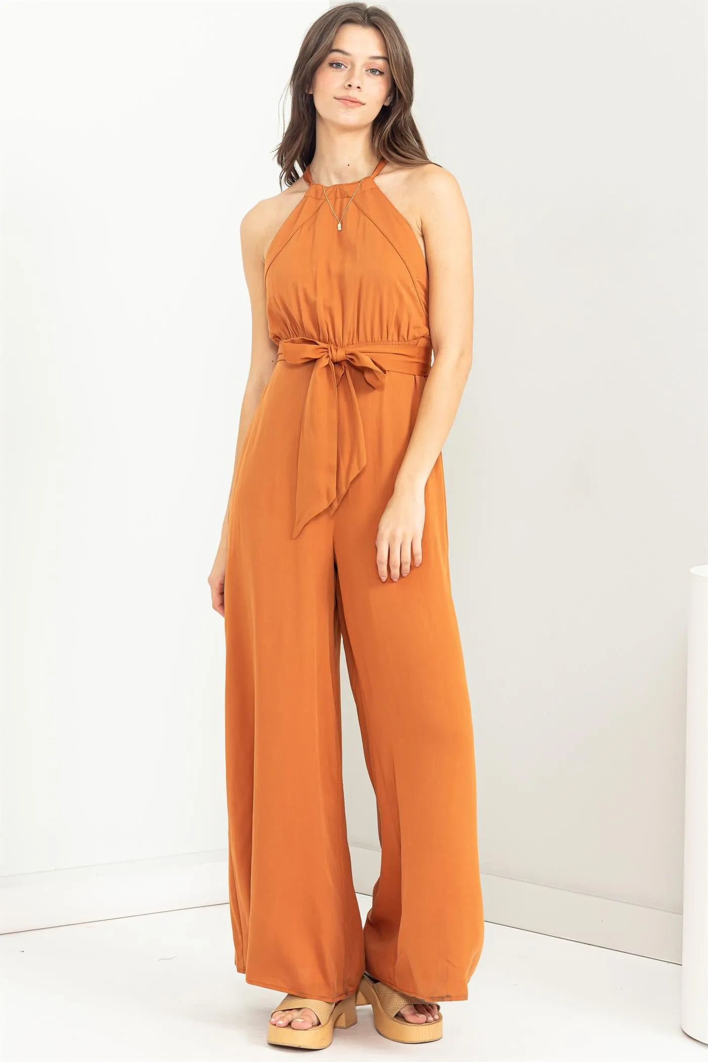 BELTED SLEEVELESS HALTER JUMPSUIT